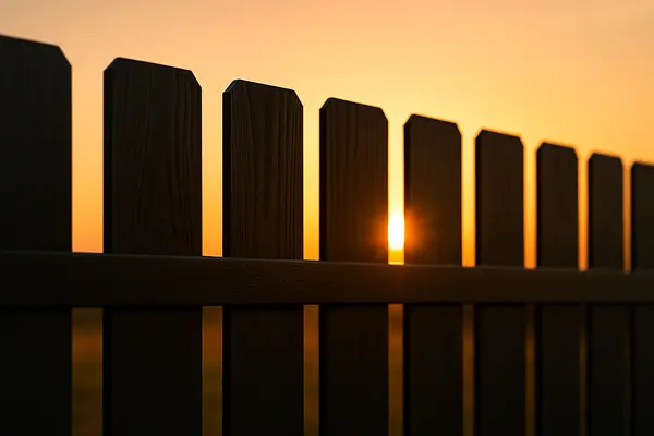 a piquet wooden fence with the sunset in the background from Dallas Fence Company in Dallas, TX - aluminum fence contractors